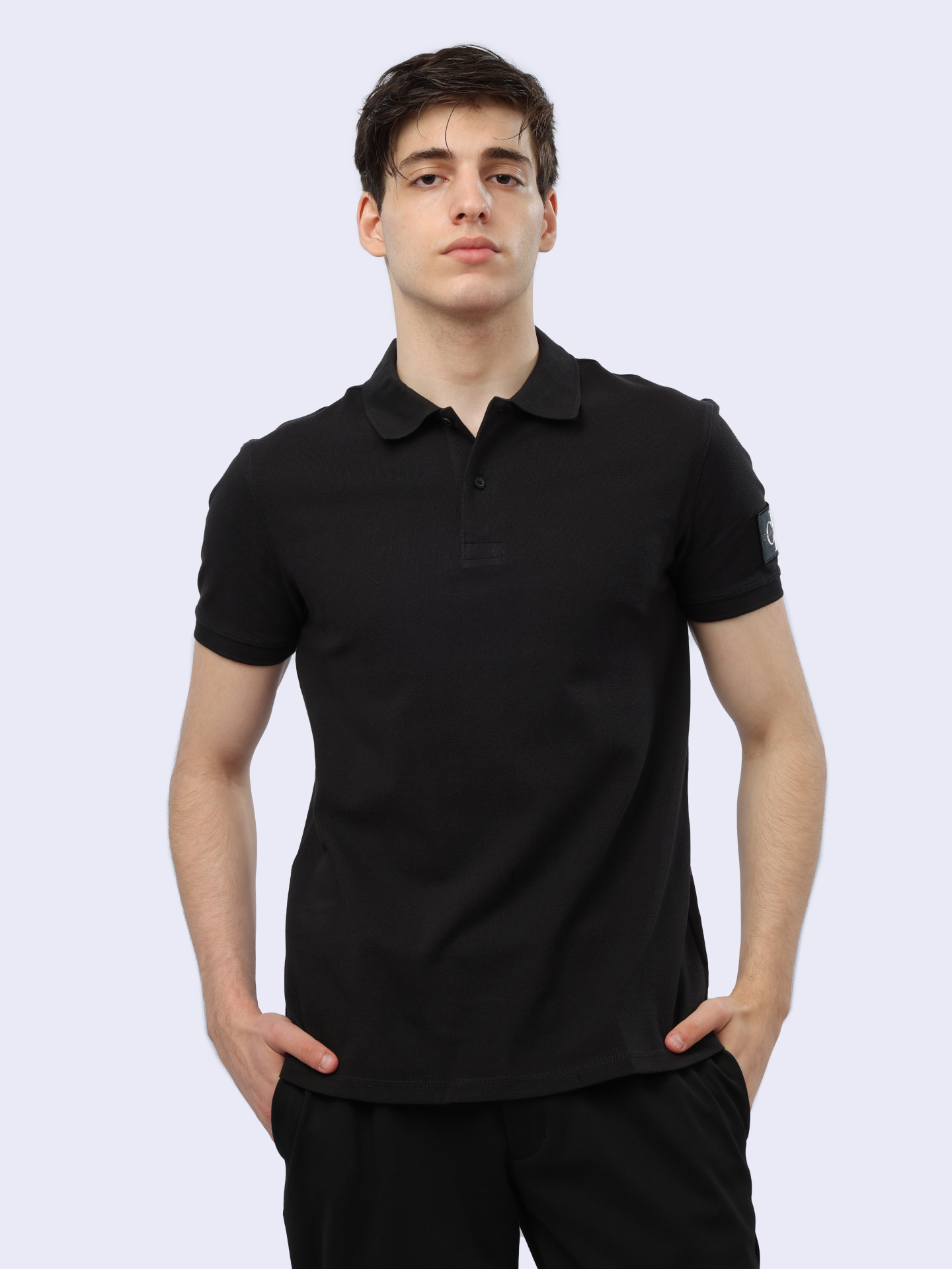 Поло Calvin Klein Jeans J30J323394 BEH черное мужское из хлопка — купить в интернет-магазине Verdistore