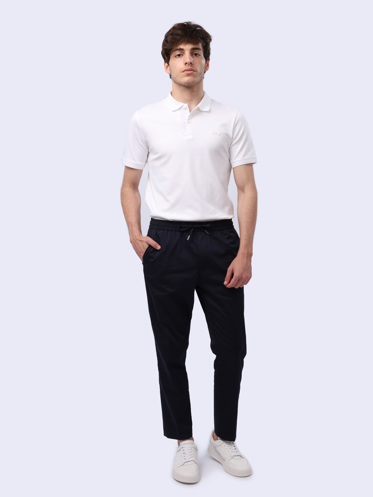 Брюки Calvin Klein K10K111705 темно-синие мужские из хлопка — купить в интернет-магазине Verdistore