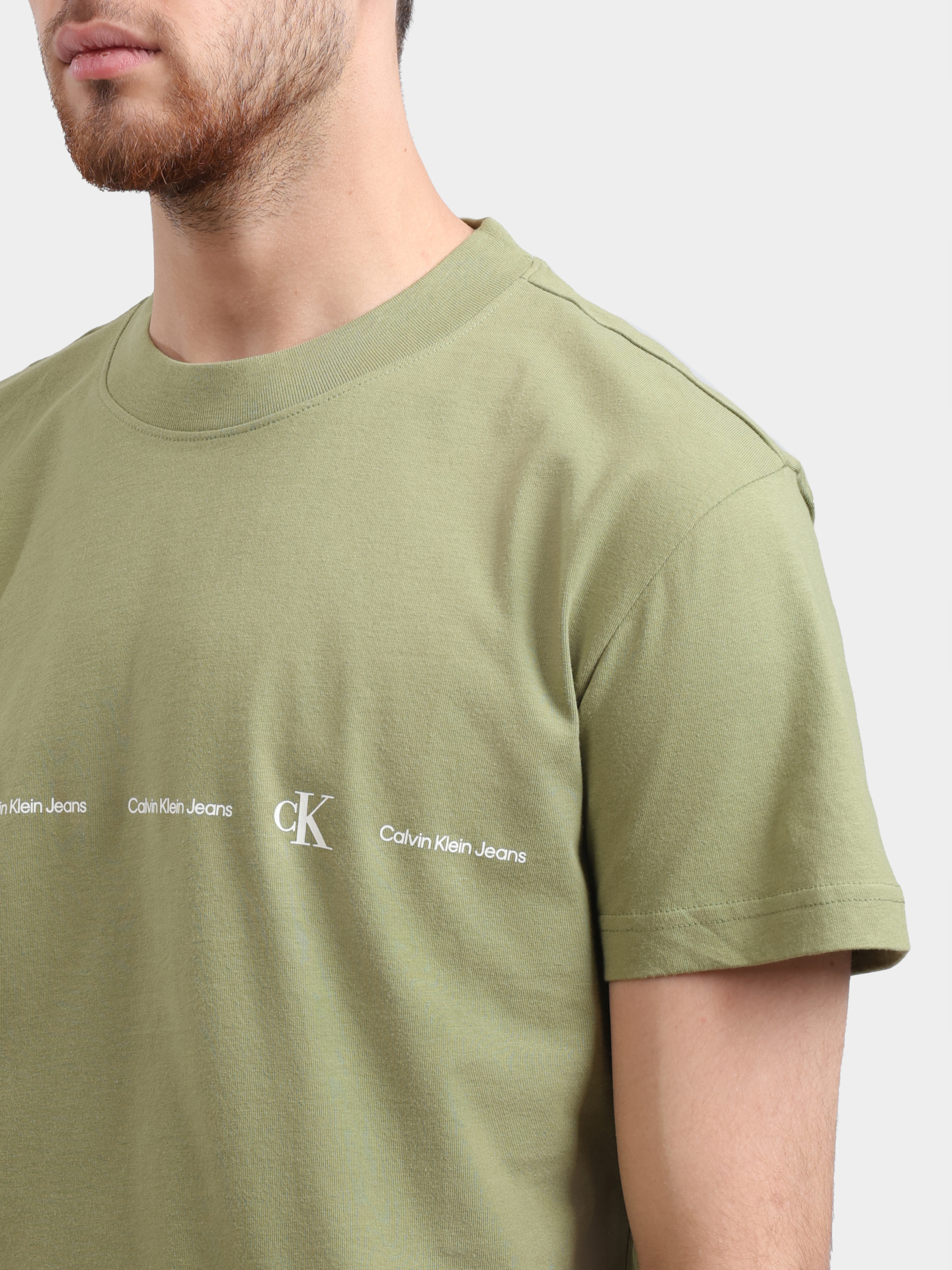 Футболка Calvin Klein Jeans J30J324668 зеленая мужская — купить в интернет-магазине Verdistore