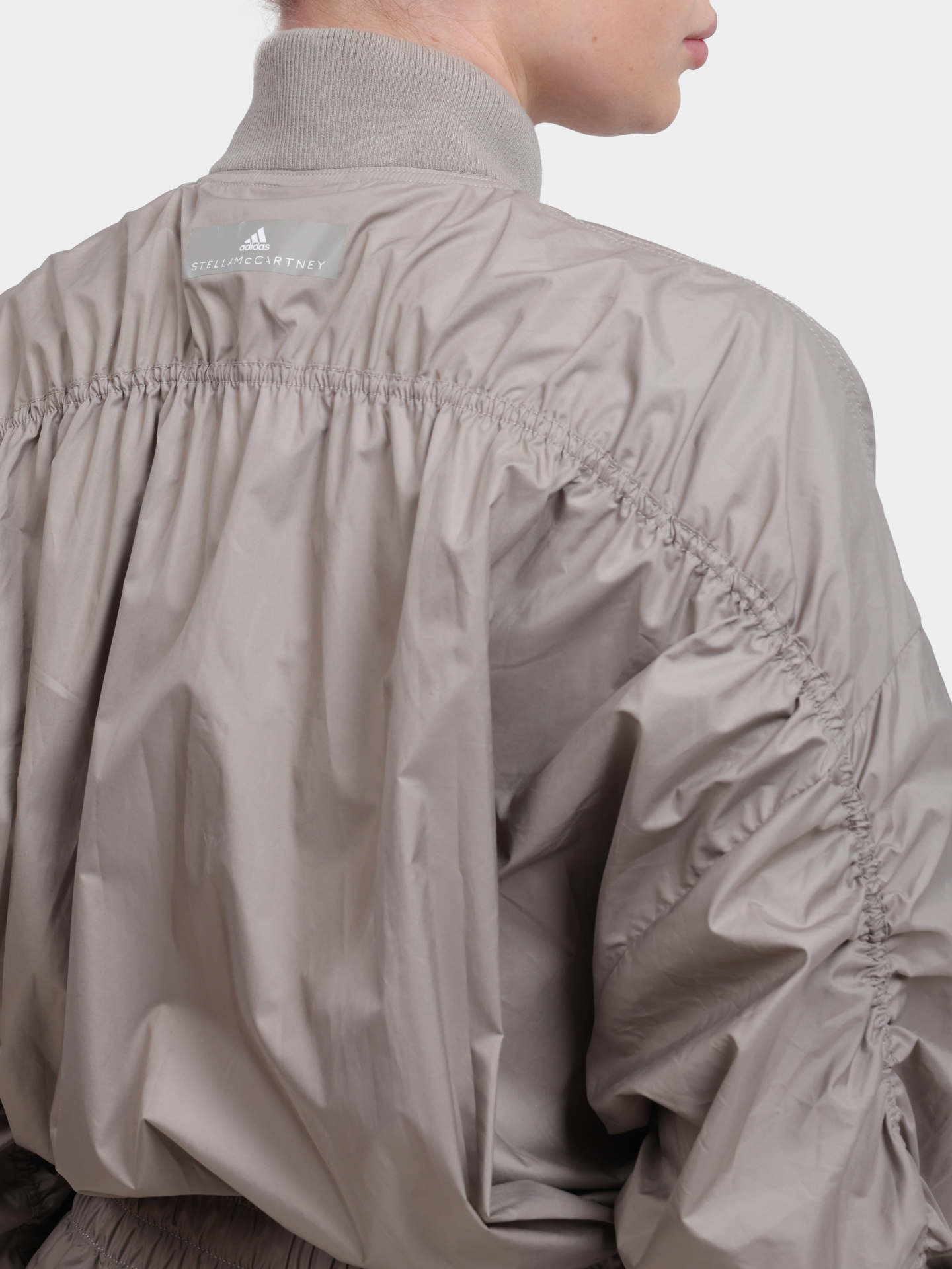 Комбинезон Adidas by Stella McCartney FK8861 бежевый женский — купить в интернет-магазине Verdistore